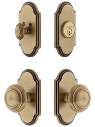 Grandeur Arc Entry Door Set, Keyed Alike with Circulair Knobs in Antique Brass.